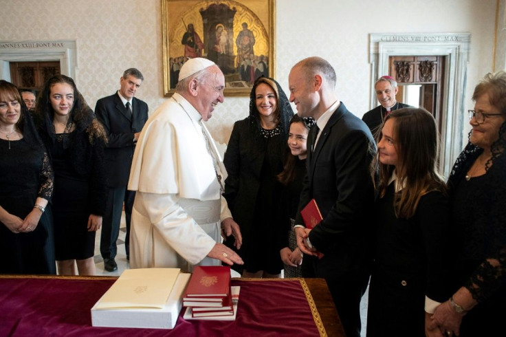 Pope Francis and Maltese Prime Minister Joseph Muscat meet at the Vatican, despite calls from academics for the pontiff to cancel the event