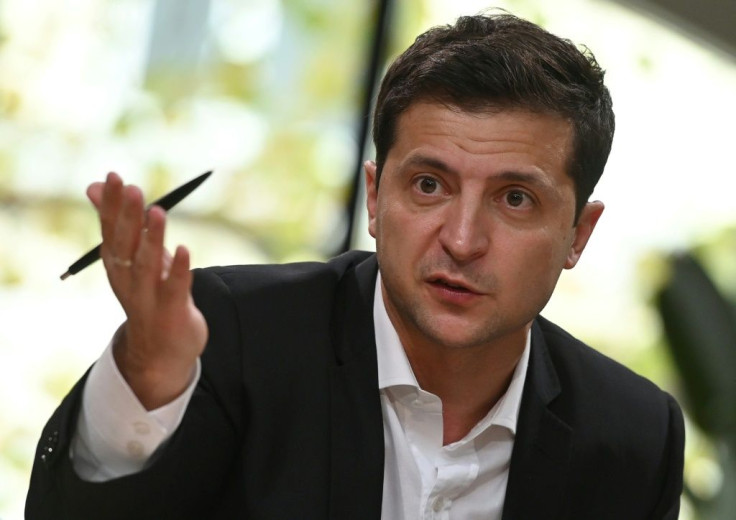 Ukrainian President Volodymyr Zelensky speaks to media on October 10, 2019