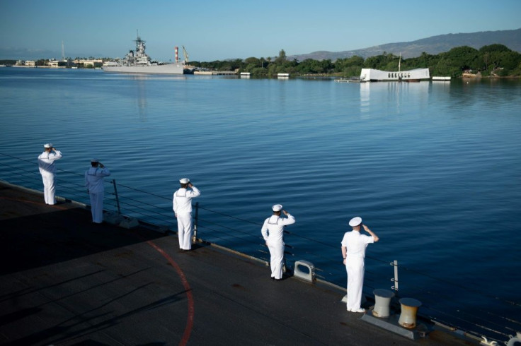 The ceremony was held within sight of the sunken USS Arizona