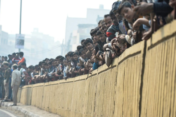 Onlookers gathered waiting for news from authorities following the blaze