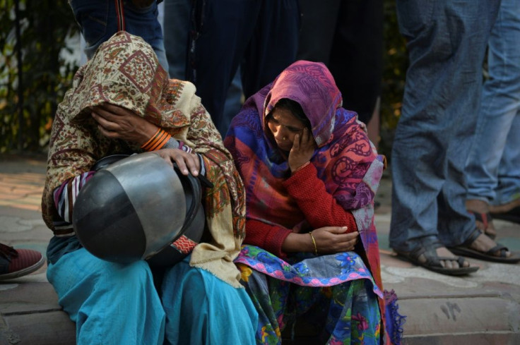 Tearful relatives spoke of receiving desperate calls from factory workers pleading to be freed from the inferno