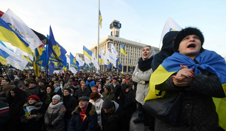 Protesters held placards with slogans such as 'No to capitulation', 'Stay away from Moscow' and 'Russian gas is a noose around our necks'