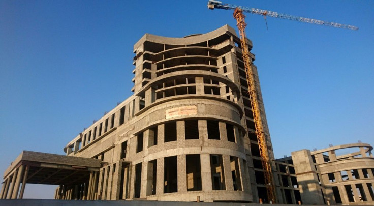 The shells of several Qatari-funded luxury hotels lie abandoned in the Saudi city of Al-Ahsa