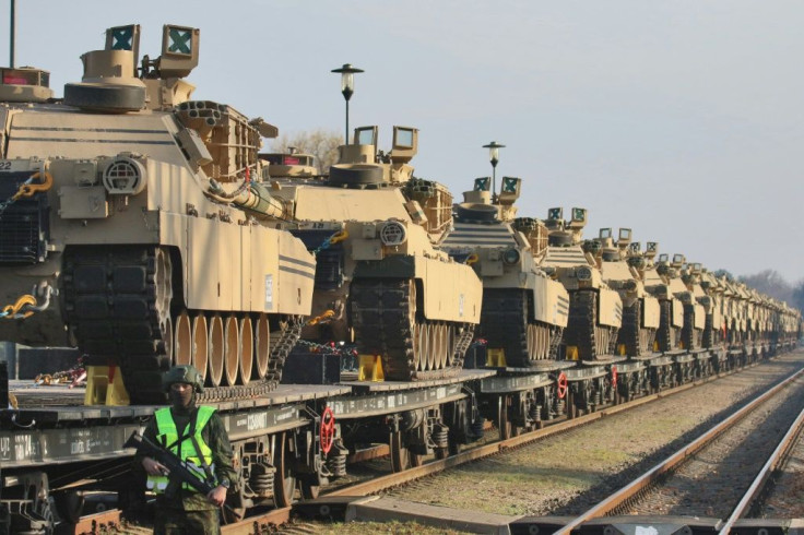 US Abrams tanks at a railway station near a military base in Lithuania, on October 21, 2019: the US Army is preparing its largest deployment of troops to Europe in 25 years, part of a show of force during rising tensions with Russia