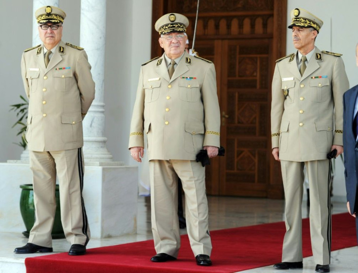 Algeria's military chief Ahmed Gaid Salah (C) has become de facto ruler since veteran president Abdelaziz Bouteflika resigned