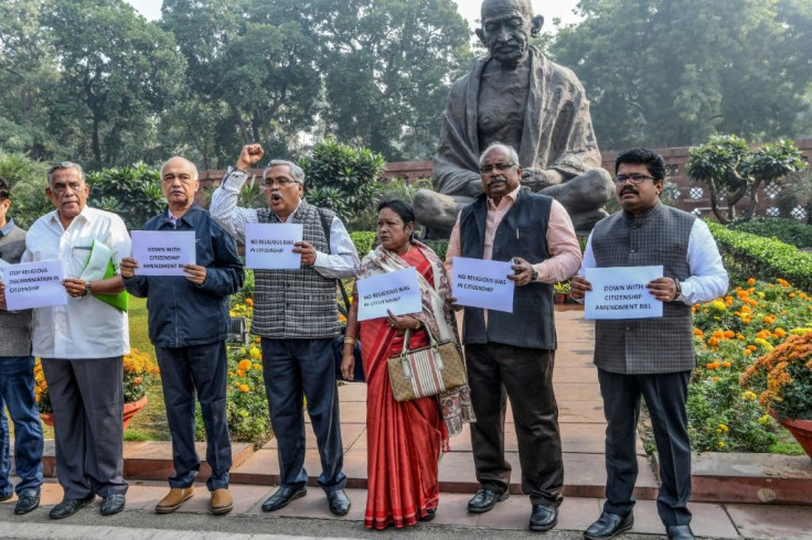 Indian MPs protest against the bill which the opposition and rights groups say fits into Prime Minister Narendra Mod's Hindu nationalist agenda