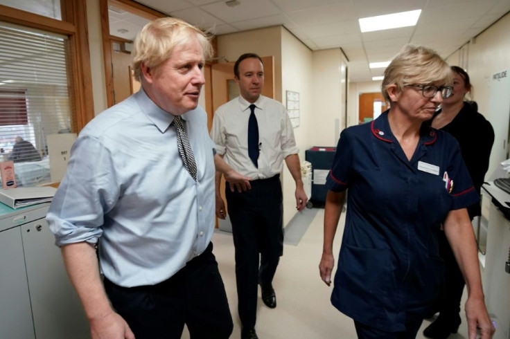Johnson came under fire for initially refusing to look at the picture of a small boy forced to sleep on a hospital floor
