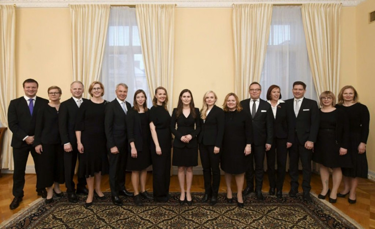Marin (C) was sworn in with her centre-left cabinet