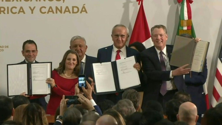 IMAGES The United States, Mexico and Canada sign a deal finalising their new trade agreement after more than two years of arduous negotiations and paving the way to ratification.