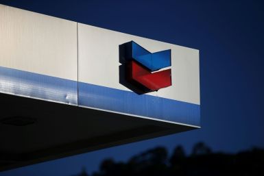 Chevron announced it will slash the value of its assets by $10 to $11 billion due to weaker oil and natural gas prices that prompted the company to consider abandoning some projects