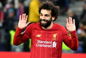 Mohamed Salah's strike from a tight angle sealed Liverpool's 2-0 win in Salzburg as they went through to the Champions League last 16