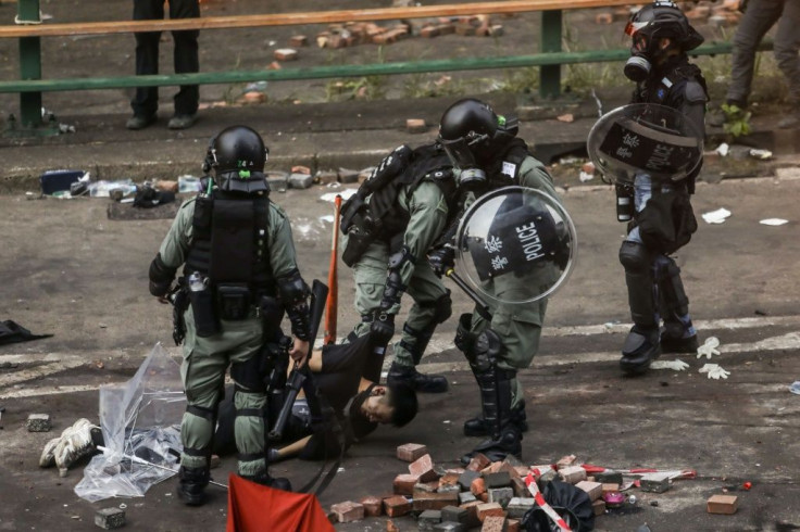 Police arrest a protester at the Hong Kong Polytechnic University in November