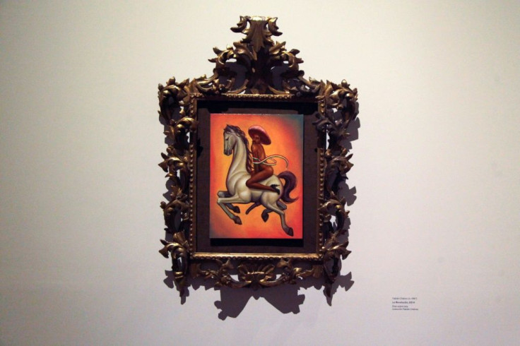 "La Revolucion" by Fabian Chairez is seen at the Palacio de Bellas Artes in Mexico City, on December 10