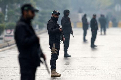 Security personnel stood guard near the stadium in Rawalpindi