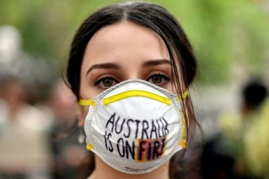 Up to 20,000 people -- many wearing face masks -- marched in Sydney, demanding Prime Minister Scott Morrison address directly the smoke crisis that has caused health problems to spike