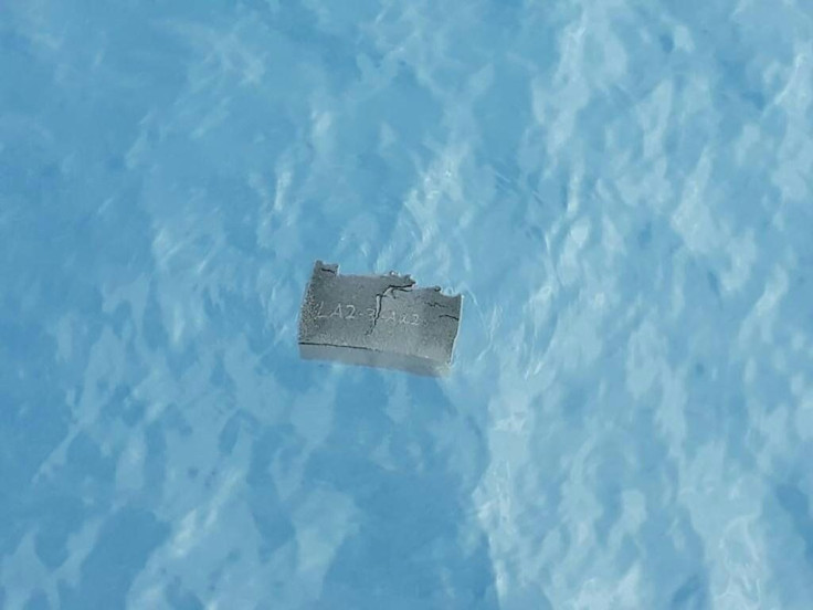 A piece of debris believed to be from the missing plane is shown in this Chilean Air Force photo
