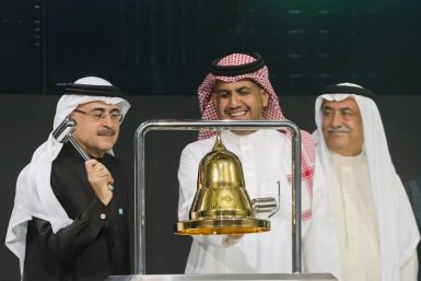 Saudi Aramco head Amin Nasser rings the bell as the oil giant's shares start trading