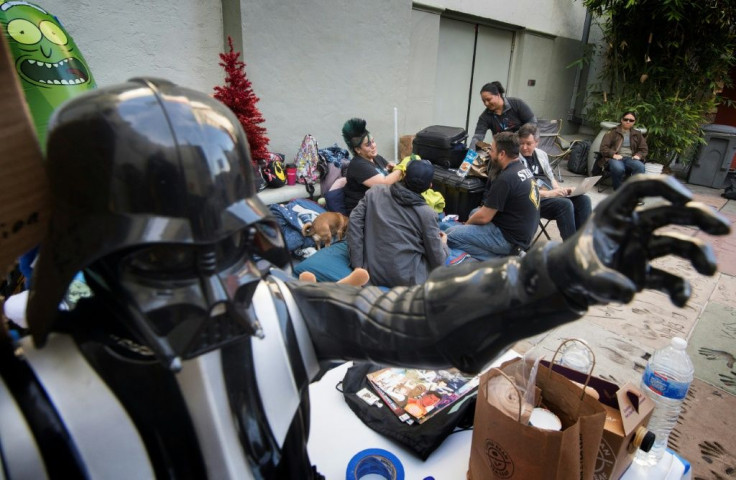 Star Wars fans wait outside the TCL Chinese Theater one week before the release of "Star Wars: The Rise of Skywalker" movie in Hollywood, California on December 12, 2019