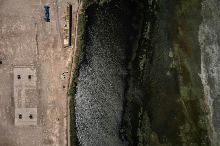 Aerial view of a manifold that collects gas from wells in a rural area around the community of Allen, where farmworker Roxana Valverde links fissures in the walls of her home to the fracking project