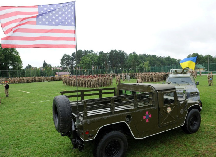 Ukrainian and US flags are flown at the opening of drills in western Ukraine's Lviv district in July 2015