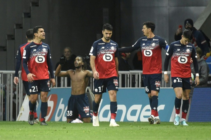 Stripped for success: Lille's Renato Sanches celebrates his winner