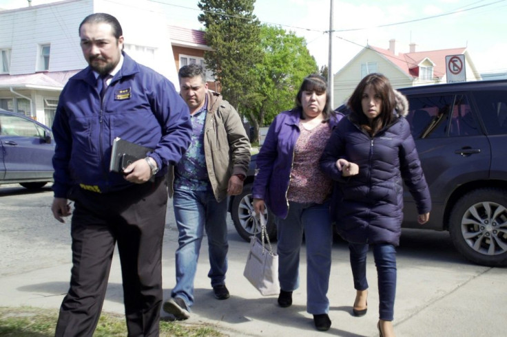Relatives of the crash victims are photographed in Punta Arenas, Chile, on December 12, 2019