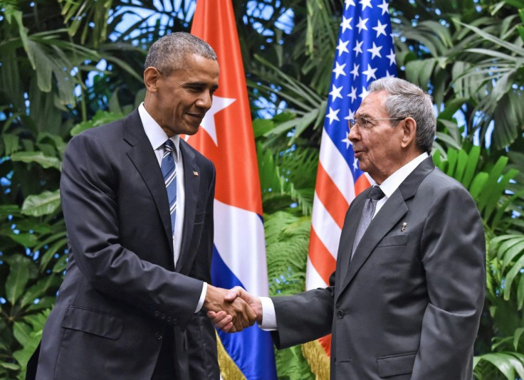 Carlos Fernandez de Cossio, Havana's top diplomat in charge of relations with Washington, recalls the "emotional moment" and hope in Cuba after US President Barack Obama (L) and his Cuban counterpart Raul Castro (R), agreed to revive diplomatic ties