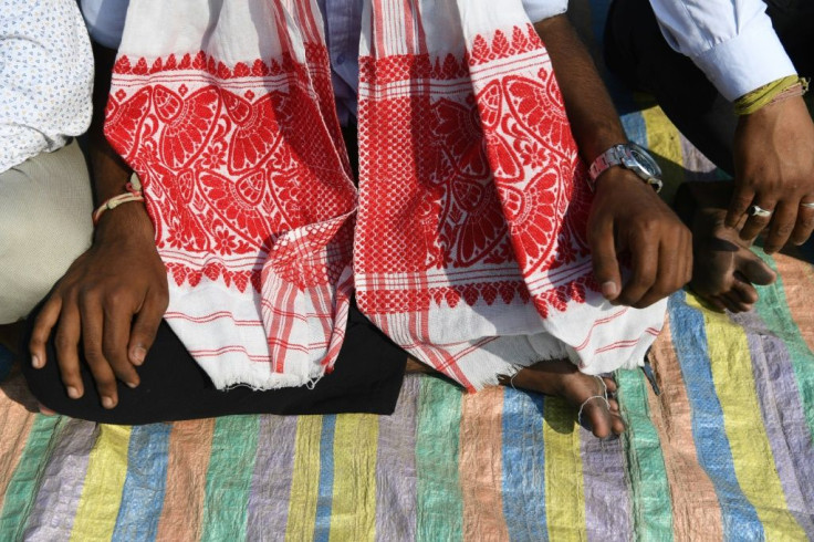 The gamosa, a red and white cloth, has come to symbolise the struggle of the Indian state's indigenous "sons of the soil" against a new citizenship law