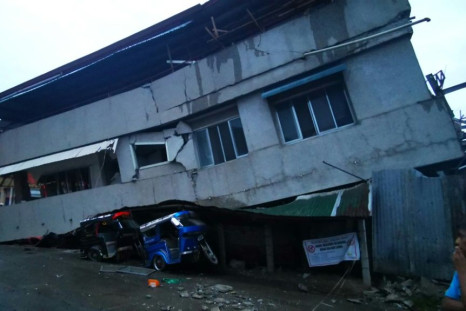 A house pancaked by the earthquake in Padada on the southern Philippine island of Mindanao