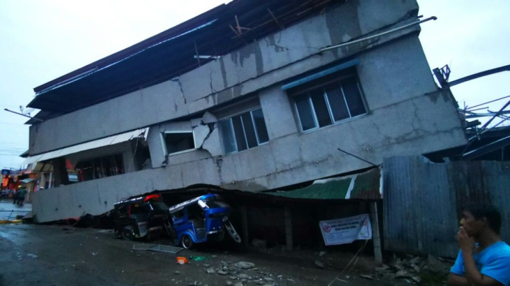 A house pancaked by the earthquake in Padada on the southern Philippine island of Mindanao
