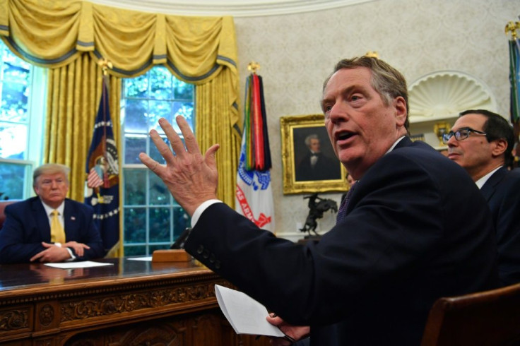 US Trade Representative Robert Lighthizer (C) in the Oval Office with US President Donald Trump (L) and Treasury Secretary Steve Mnuchin