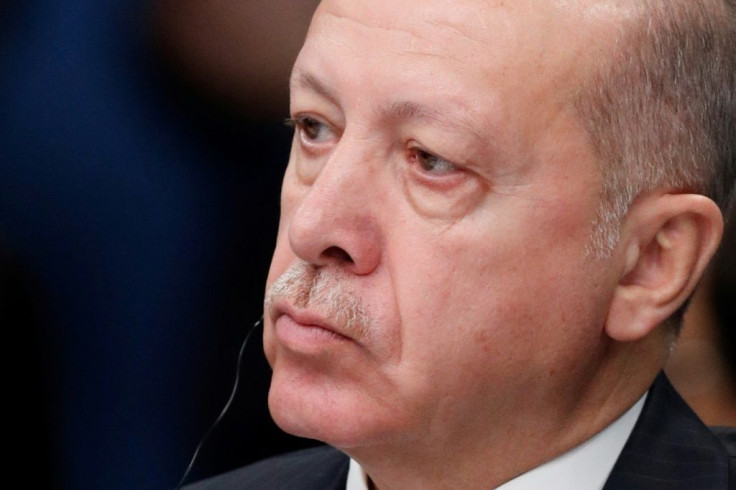 The closed-door meetingÂ took place in Istanbul's Ottoman-era Dolmabahce Palace; pictured is Turkey's President Recep Tayyip Erdogan on December 4, 2019