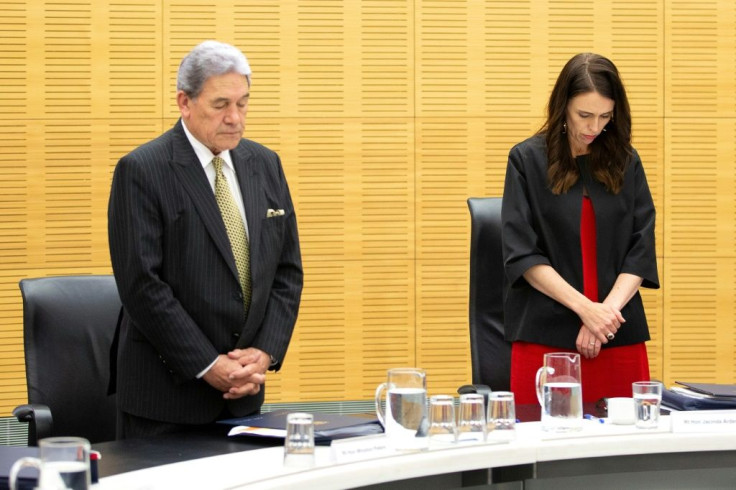 New Zealand Prime Minister Jacinda Ardern leads a minute's silence to remember the volcano victims