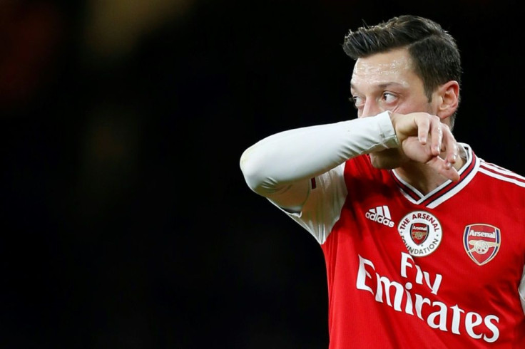 Arsenal's German midfielder Mesut Ozil criticised China's treatment of the Uighur Muslim minority