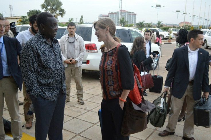 Martin Elia Lomuro, South Sudan's minister for cabinet affairs, speaks in 2014 with the then US ambassador to the United Nations, Samantha Power, at Juba airport