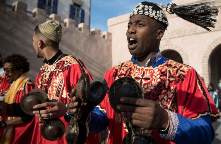 Often dressed in colourful outfits, Gnawa musicians play the guenbri, a type of lute with three strings, accompanied by steel castanets called krakebs