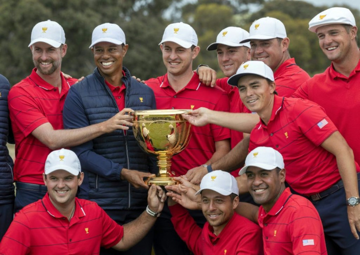 Leading from the front: Tiger Woods and his teammates pose with the Presidents Cup
