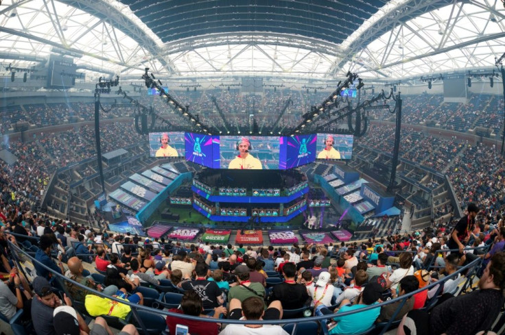 Tyler "Ninja" Blevins (on screen), one of the biggest Fortnite stars, speaks to the crowd at the start of the 2019 Fortnite World Cup Finals in July 2019 at Arthur Ashe Stadium in New York