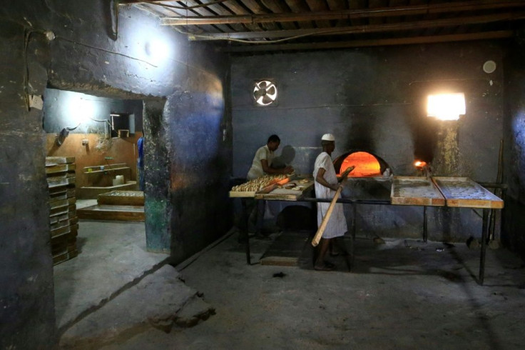 Sudanese bakers prepare loaves in Atbara, the cradle of protests against the price of bread this time last year which eventually brought the downfall of President Omar al-Bashir in April