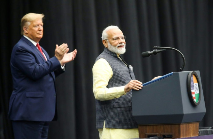 US President Donald Trump claps for Indian Prime Minister Narendra Modi as they address a joint rally in Houston in September 2019 -- their top ministers are set to meet in Washington