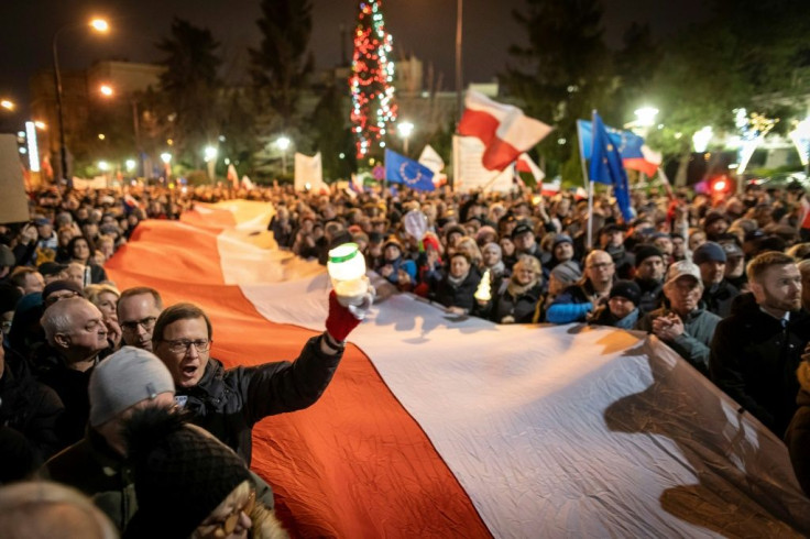 Thousands of people took to the streets in Warsaw and outside courts in dozens of other towns