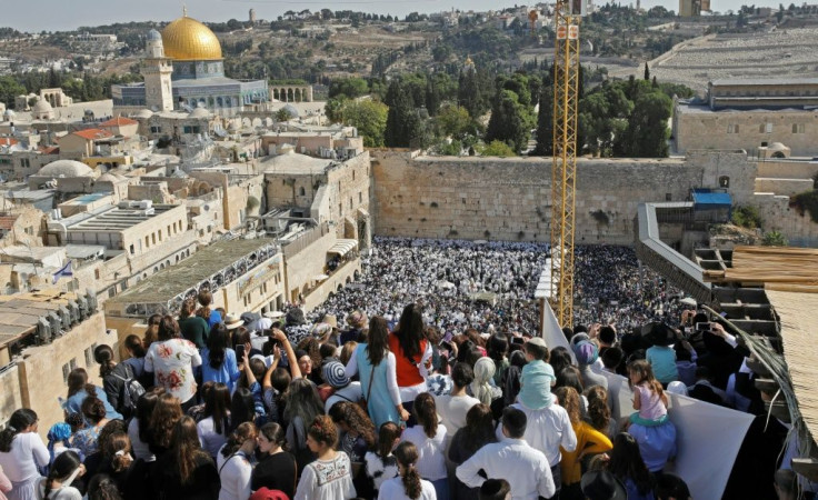 The Western Wall is located on the Temple Mount, the most sacred place in Judaism, and is directly adjacent to the Al-Aqsa mosque, one of the holiest sites in Islam