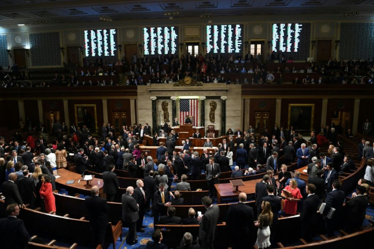 US Speaker of the House Nancy Pelosi presides over voting on articles of impeachment against President Donald Trump on Wednesday