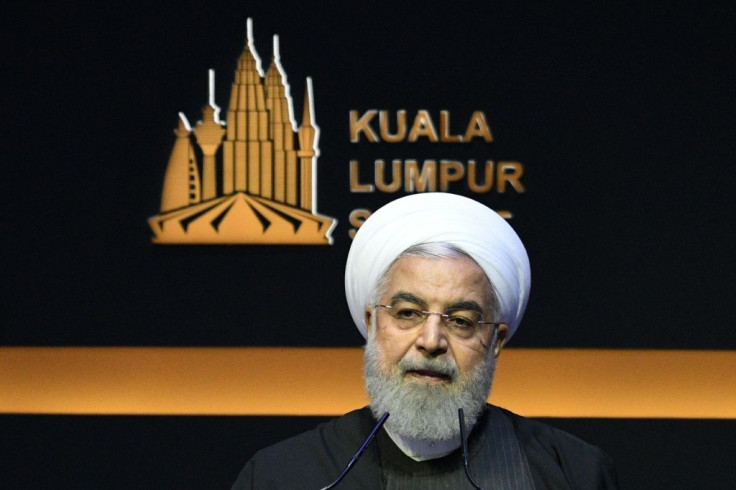 Iran's President Hassan Rouhani speaking during the opening ceremony of the Kuala Lumpur Summit of Muslim leaders