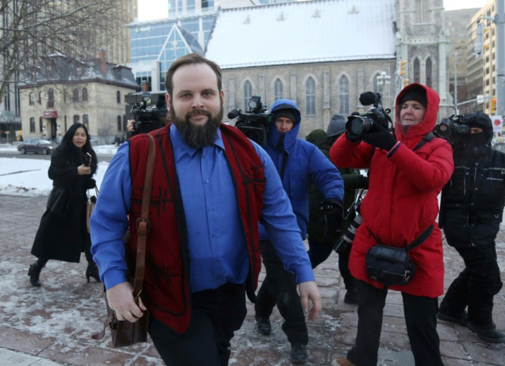 Former Afghan hostage Joshua Boyle leaves the Ottawa courthouse after charges he abused his wife and another person are dismissed