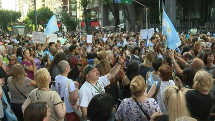 Hundreds of people protested outside Argentina's Congress against the new 'tourist dollar' tax proposed by President Alberto Fernandez