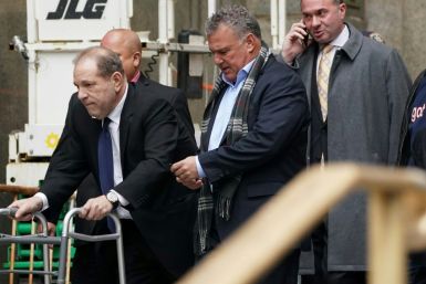 Disgraced Hollywood mogul Harvey Weinstein leaves a court hearing in New York using a walking frame