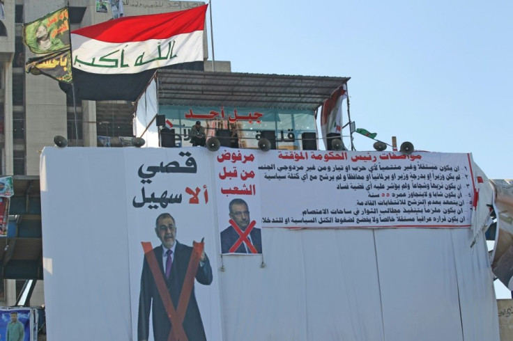 Iraqi demonstrators have put up a poster rejecting outgoing higher education minister Qusay al-Suhail as a potential nominee for prime minister