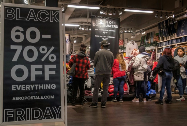 Shoppers at a clothing store look for early Black Friday bargains in Los Angeles, California