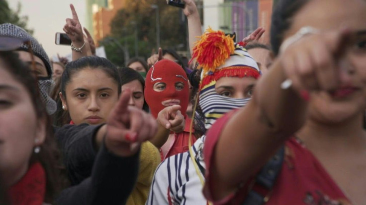More than a thousand women have take the feminist anthem "A Rapist In Your Way" into the streets of Chile's capital Santiago, performing the rallying cry sung in cities across the globe.